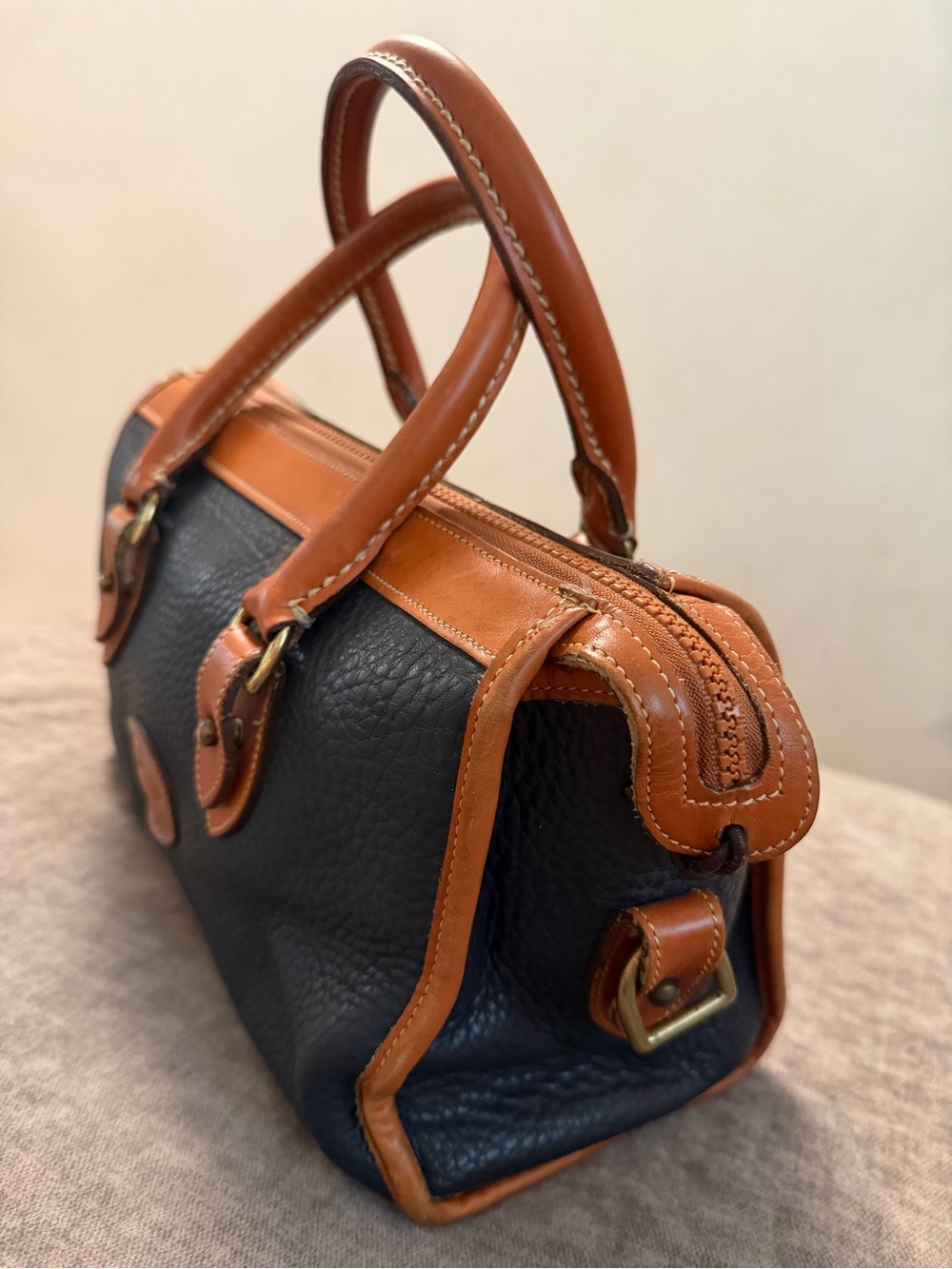 Dooney & Bourke Navy and Tan Pebbled Leather Satchel
